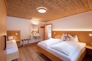Tempat tidur dalam kamar di Eden Appartements