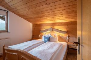 Tempat tidur dalam kamar di Eden Appartements