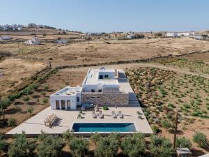 an aerial view of a house with a swimming pool at Bracket House Paros in Prodromos Paros