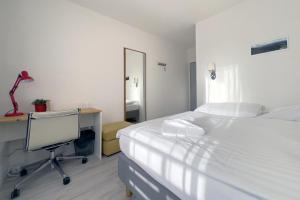 Postel nebo postele na pokoji v ubytování Hotel Horní Pramen + 37 fotografií