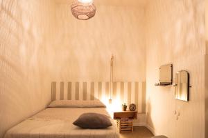 Postel nebo postele na pokoji v ubytování Hotel Cervetta 5