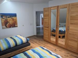 Postel nebo postele na pokoji v ubytování Ferienwohnung Lang