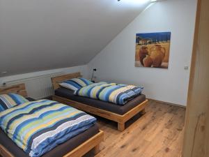 Postel nebo postele na pokoji v ubytování Ferienwohnung Lang