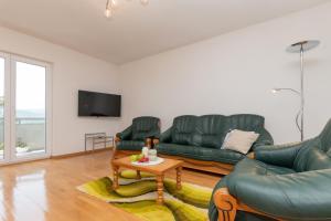 TV a/nebo společenská místnost v ubytování Apartman Maria