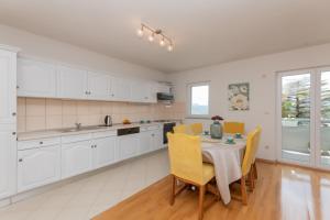 Kuchyň nebo kuchyňský kout v ubytování Apartman Maria + 10 fotografií