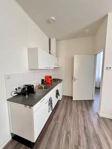 Kuchyň nebo kuchyňský kout v ubytování 86 3City Appartement met Privé parkeerplaats