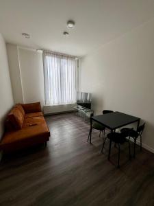 Posezení v ubytování 86 3City Appartement met Privé parkeerplaats