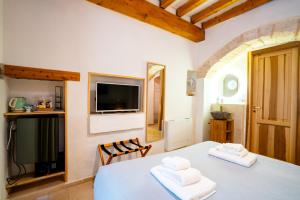 Postel nebo postele na pokoji v ubytování L'ARCO ANTICO - Una Casa sul Mare