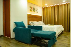 Postel nebo postele na pokoji v ubytování BOG Living Suites