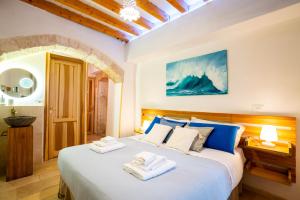 Postel nebo postele na pokoji v ubytování L'ARCO ANTICO - Una Casa sul Mare