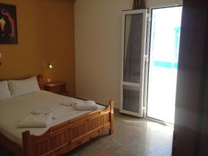 Postel nebo postele na pokoji v ubytování Sea View And Mountain View Apartment For 4 People