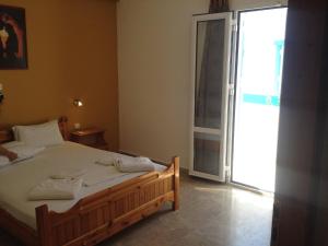 Postel nebo postele na pokoji v ubytování Sea View And Mountain View Apartment For 4 People
