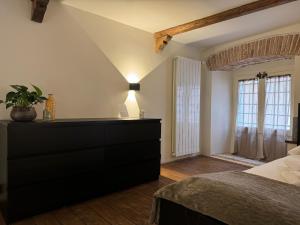 Katil atau katil-katil dalam bilik di Domus Merulae B&B