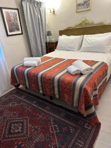 Voodi või voodid majutusasutuse Familly rooms (two rooms) Cà del Traghetto toas