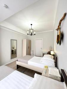 Ένα ή περισσότερα κρεβάτια σε δωμάτιο στο Compass Hostel