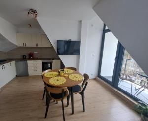 Una cocina o zona de cocina en Apartman Yellow Moon