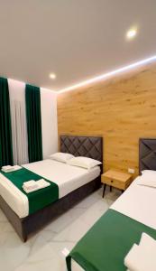 Katil atau katil-katil dalam bilik di Apartments Oda Hotel