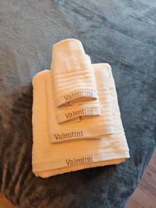 a stack of wooden cutting boards on a table at LaRenta Sveti Vlas, ulitsa Cherno more 12 in Sveti Vlas