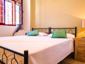 Voodi või voodid majutusasutuse Suitur vista Bahía apartment with jucuzzi barbacue toas +13 fotot