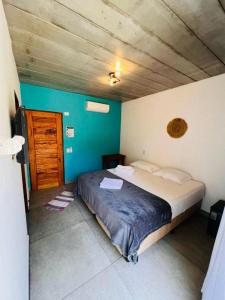 Katil atau katil-katil dalam bilik di Reserva Ilhabela