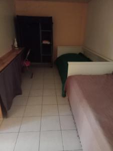 Postel nebo postele na pokoji v ubytování LA COLOMBE