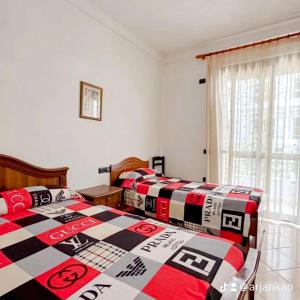 Postel nebo postele na pokoji v ubytování A-Vila