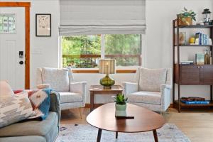 a living room with a couch and two chairs and a table at Perch - Serenity Nest in Ashford +42 photos