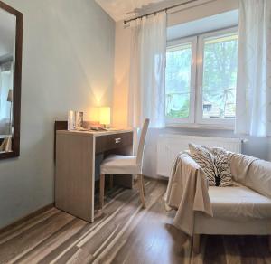 Posedenie v ubytovaní Willa Jagiellonka apartamenty w centrum, parking