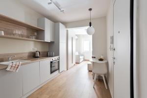 Η κουζίνα ή μικρή κουζίνα στο Harmonia Minimal Apartments