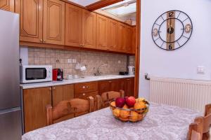 Kuchyň nebo kuchyňský kout v ubytování Sotiris Apartment