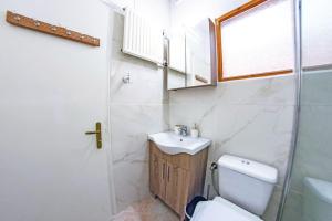 Koupelna v ubytování Sotiris Apartment