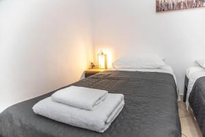 Postel nebo postele na pokoji v ubytování Sotiris Apartment