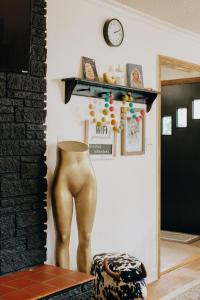 a statue of a mannequin on a table in a room at Dolly House in Sevierville