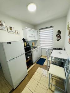 Kuchyň nebo kuchyňský kout v ubytování New! Mini Casa de Playa