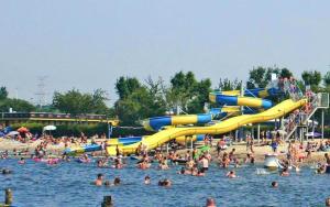 a bunch of people in the water at a water park at Chalet Between Ostend and Bruges in Jabbeke