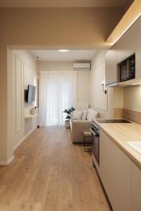 Μια τηλεόραση ή/και κέντρο ψυχαγωγίας στο Harmonia Minimal Apartments