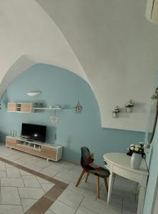 TV a/nebo společenská místnost v ubytování Casa vacanze Vista Castello