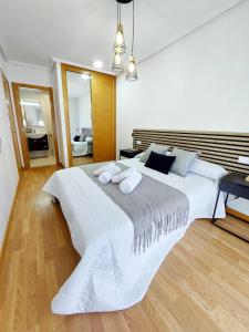 Ένα ή περισσότερα κρεβάτια σε δωμάτιο στο Atalaia Apartment Foz
