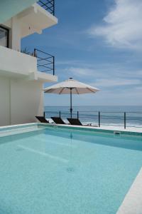 Bazén v ubytování Cabo Break Hotel nebo v jeho okolí