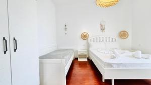 Postel nebo postele na pokoji v ubytování Las Nubes Rooms