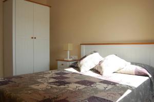 Postel nebo postele na pokoji v ubytování Apartament Escaladei
