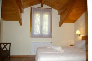 Postel nebo postele na pokoji v ubytování Casa Requias