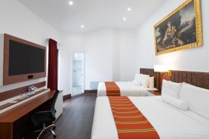 Letto o letti in una camera di Terra Andina Colonial Mansion