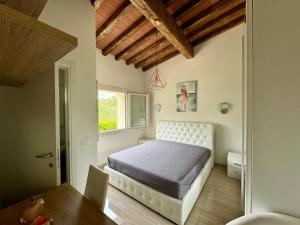 Postel nebo postele na pokoji v ubytování VILLETTA LE PAVANE ISOLA D'ELBA + 28 fotografií