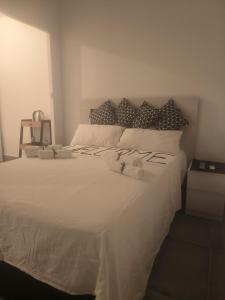 Posteľ alebo postele v izbe v ubytovaní Pinar Suites Habitaciones