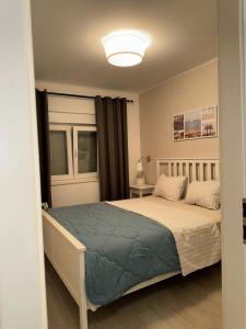 Katil atau katil-katil dalam bilik di Apartman Dukić