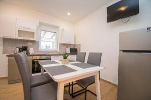 Kuchyň nebo kuchyňský kout v ubytování Apartment Luka
