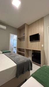 Postel nebo postele na pokoji v ubytování Hotel Minorus