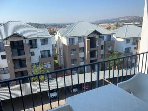 a view of a balcony of a apartment building at The little Falls Lifestyle Estate in Roodepoort