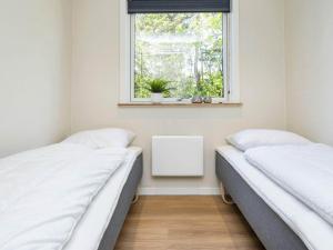 Кровать или кровати в номере Holiday home Skjern XI